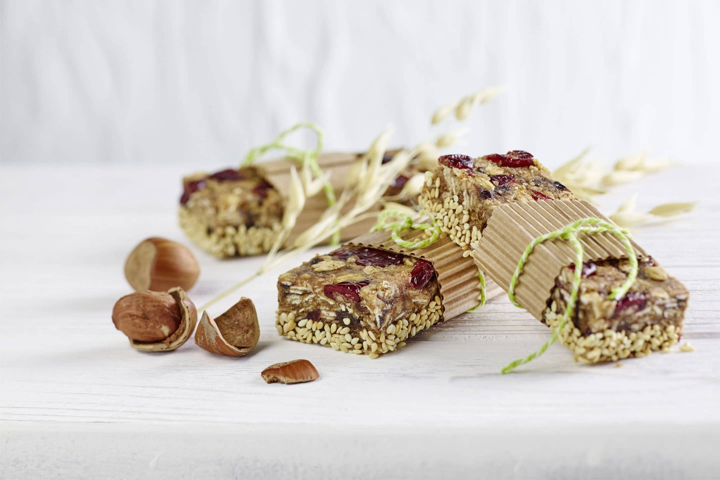 Power bar with hazelnut and cardamom wrapped in some paper