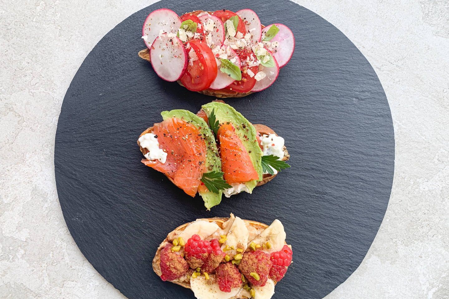 Sweet Potato Toasts on a dark plate