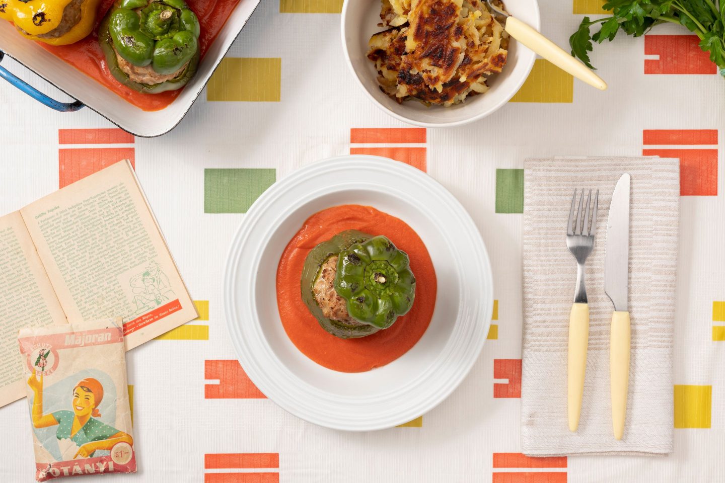 Stuffed bell peppers with minced meat seasoned with marjoram and tomato sauce.